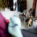 Betsy Giberson, of New Hampshire, works on a vest in her clothing booth at the Ann Arbor Street Art Fair, Friday, July 19, 2013. Melanie Maxwell | AnnArbor.com